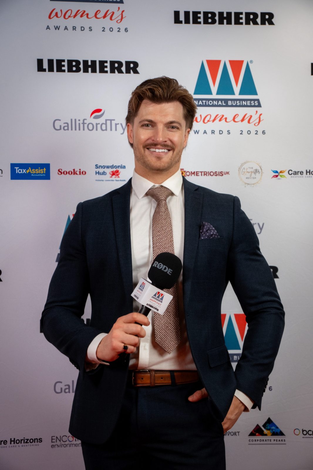 Edd Charlton hosting a red carpet interview
