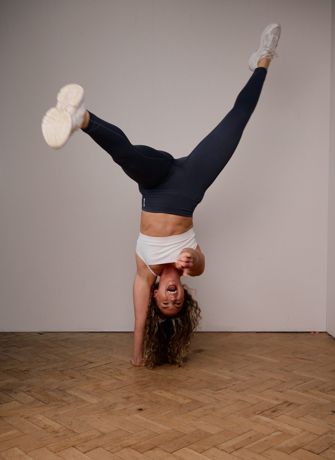 Latasha Arnone in an energetic fitness pose