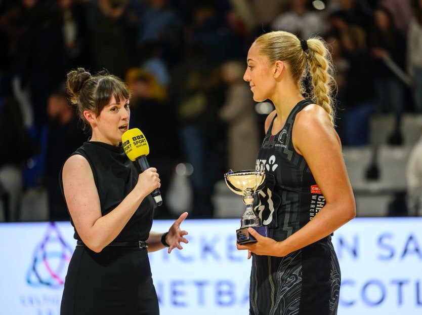 Lucy Goodman interviewing a player pitchside