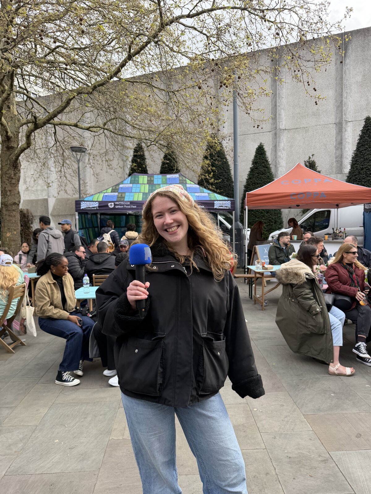 Megan Titterington broadcasting the CHANEL J12 Boat Race for Riverside Radio