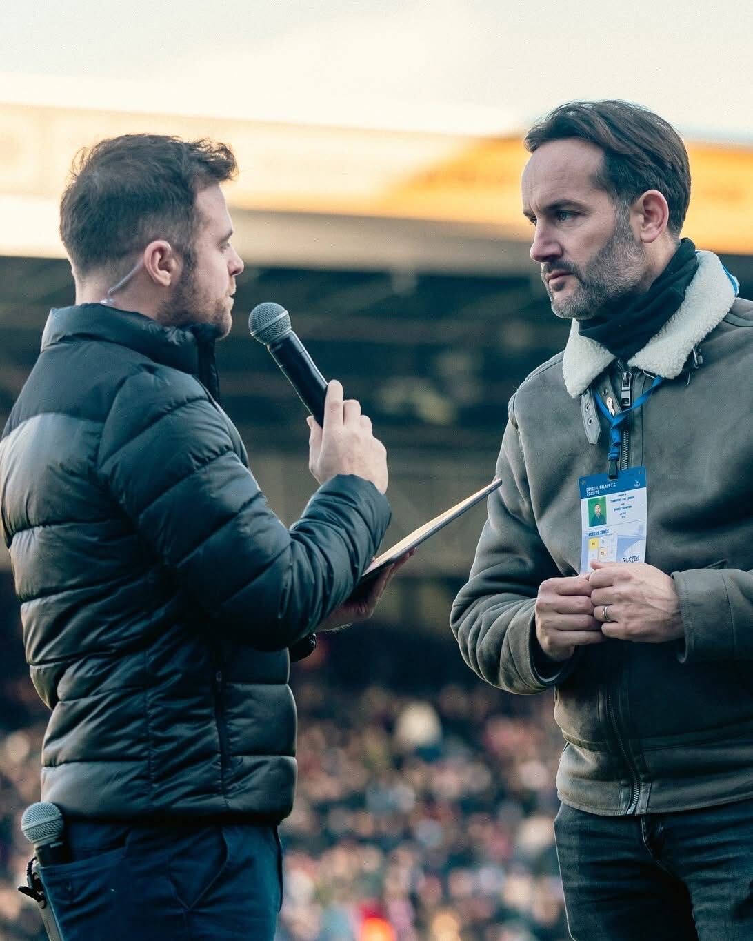 Rob Thornton interviewing a fan outside Crystal Palace FC's stadium
